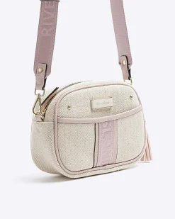 Beige canvas cross body camera bag