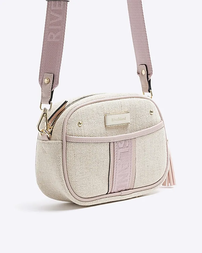 Beige canvas cross body camera bag