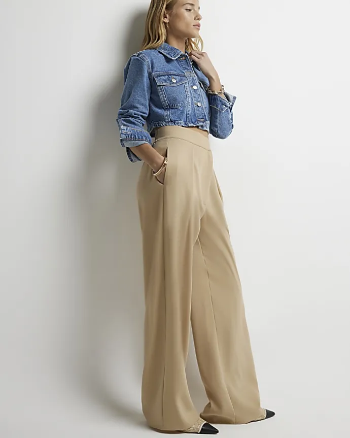 Beige high waisted wide leg trousers