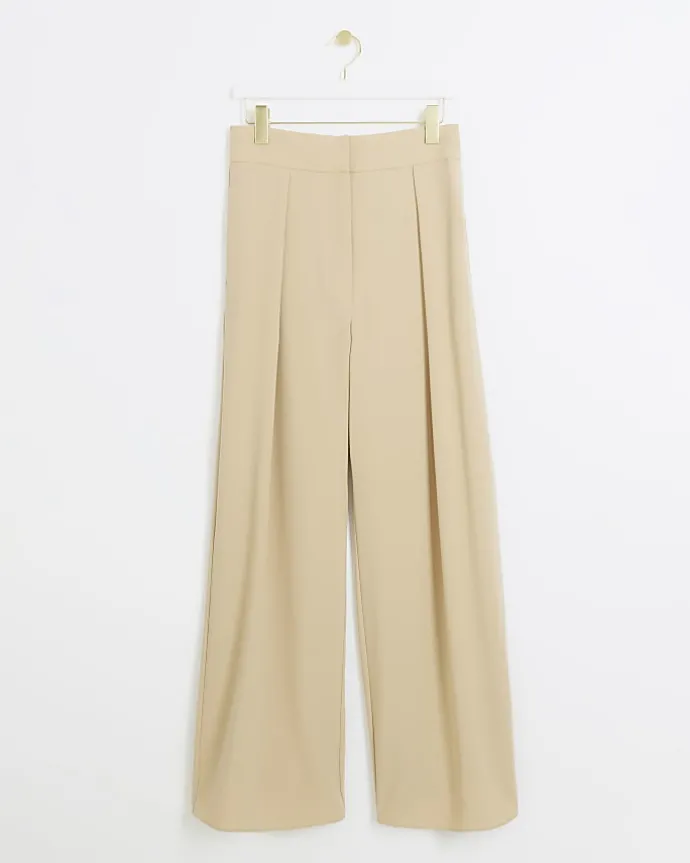 Beige high waisted wide leg trousers