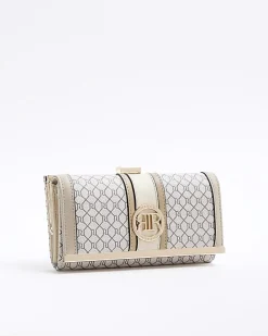 Beige monogram clip top purse