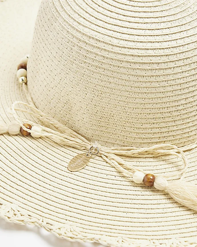 Beige straw beaded hat