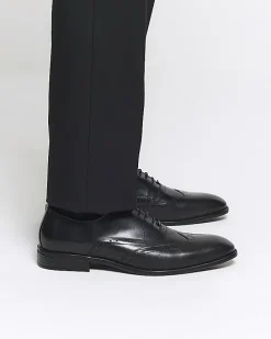 Black brogue derby shoes