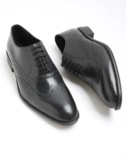 Black brogue derby shoes