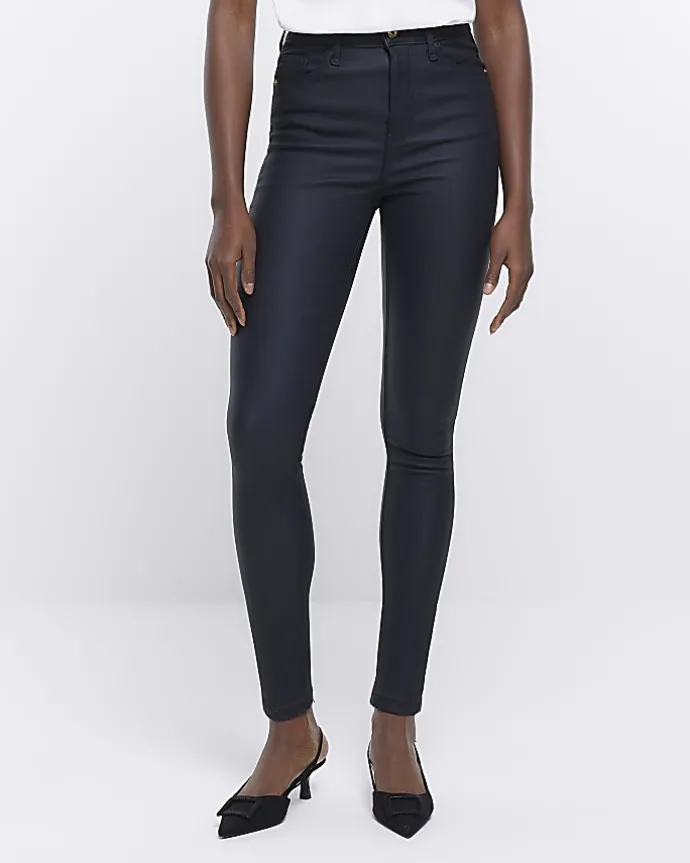 Black coated denim high waisted skinny jeans