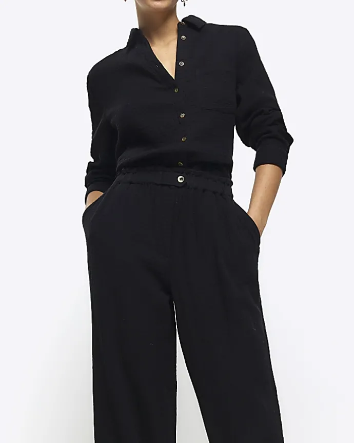 Black elasticated wide leg trousers