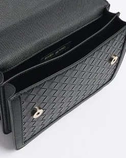 Black embossed weave shoulder bag