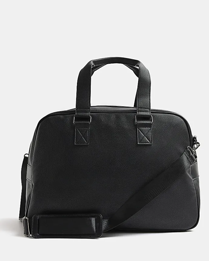 Black faux leather holdall
