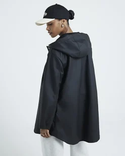 Black hooded rain coat