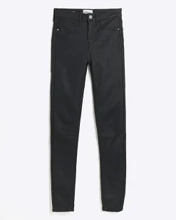Black mid rise skinny coated jeans