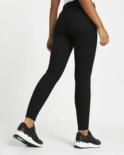 Black mid rise skinny jeans