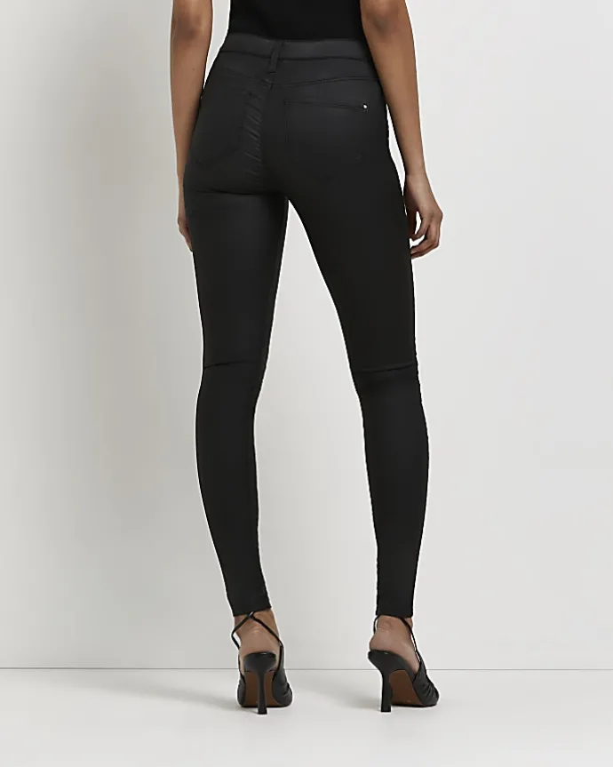 Black Molly coated mid rise skinny jeans