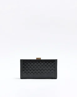 Black quilted clip top purse