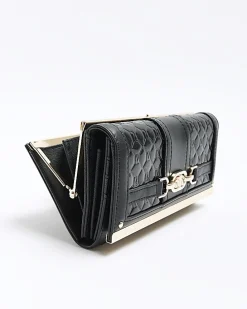 Black quilted clip top purse
