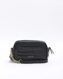 Black quilted flap front cross body bag