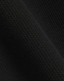 Black regular fit smart texture zip neck polo