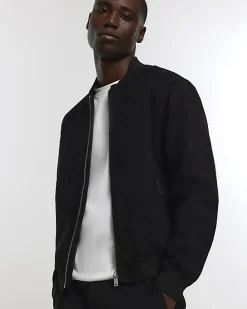 Black regular fit suedette bomber jacket