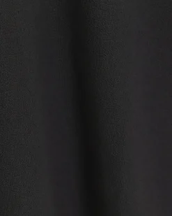 Black regular fit textured half zip polo