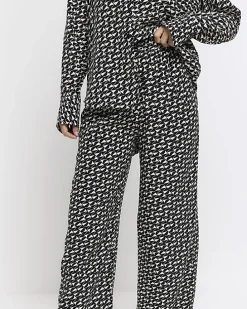 Black satin geometric wide leg trousers