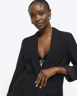 Black shawl collar roll sleeve blazer