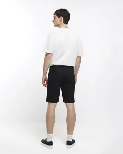Black skinny fit denim shorts