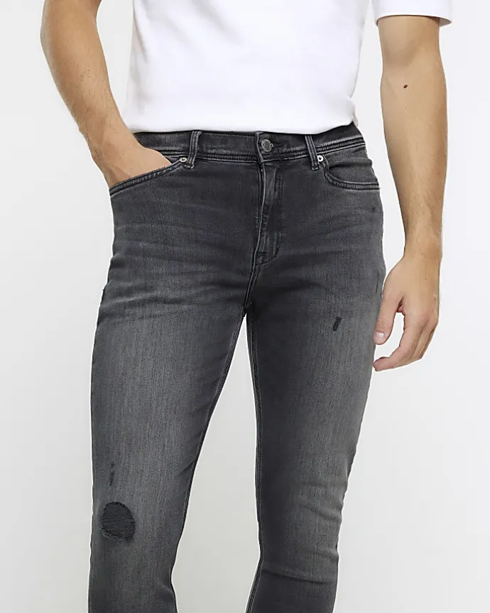 Black spray on super skinny fit ripped jeans