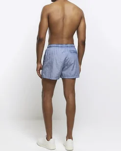 Blue elasticated swim shorts