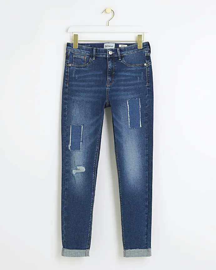 Blue mid rise bum sculpt patch skinny jeans