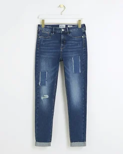 Blue mid rise bum sculpt patch skinny jeans