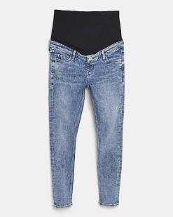 Blue mid rise maternity skinny jeans