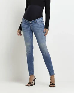 Blue mid rise maternity skinny jeans