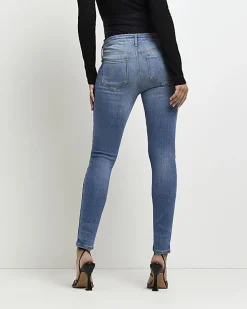 Blue mid rise maternity skinny jeans