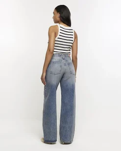 Blue mid rise ripped wide leg jeans