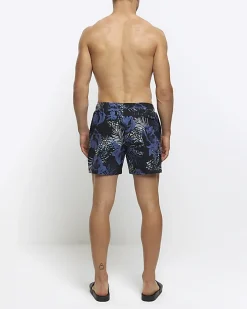 Blue regular fit botanical print shorts