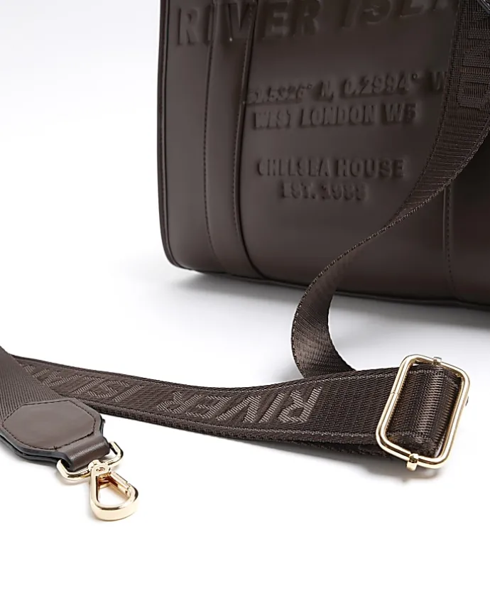 Brown embossed cross body tote bag