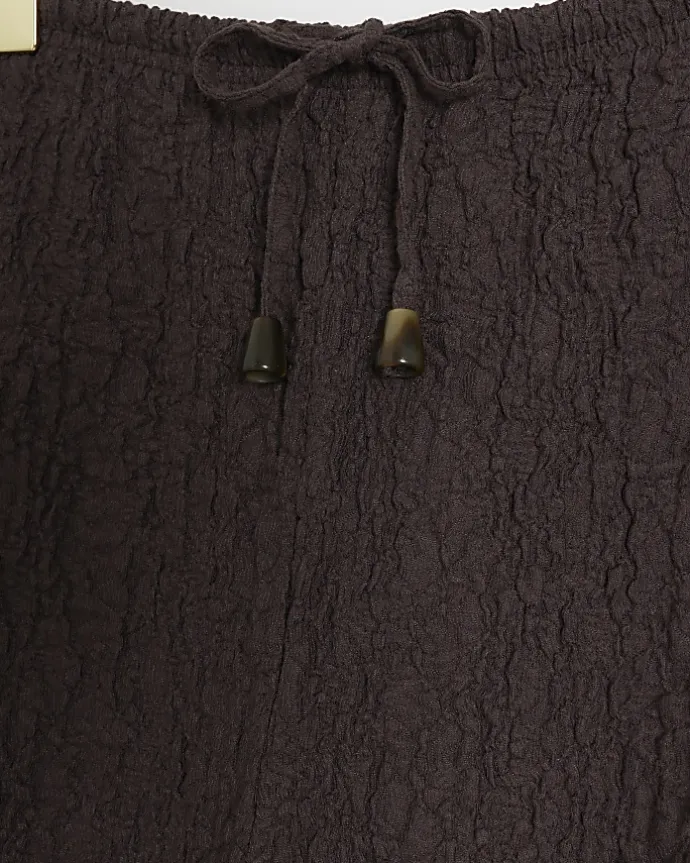 Brown textured wide leg trousers