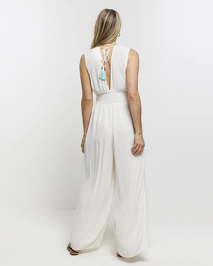 Cream embellished plunge jumpsuit