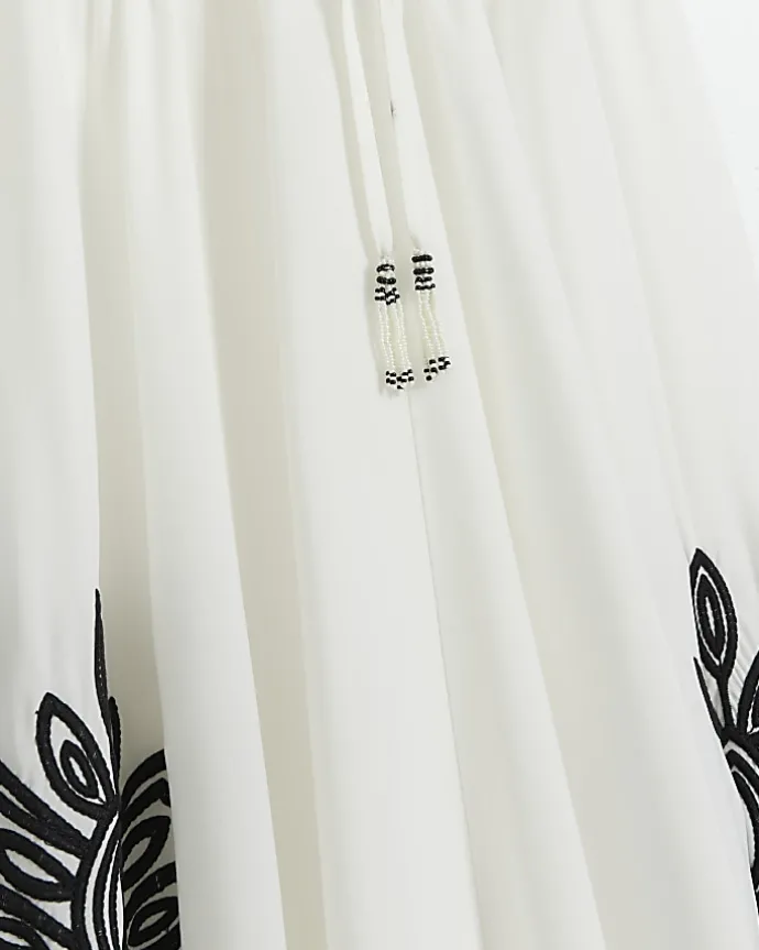 Cream embroidered plunge beach maxi dress