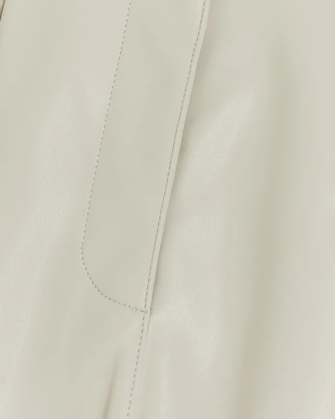 Cream faux leather paperbag trousers