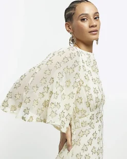 Cream glitter star maxi dress