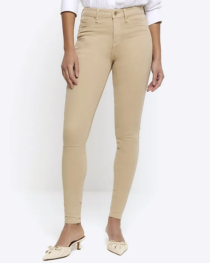 Cream mid rise bum sculpt jeggings