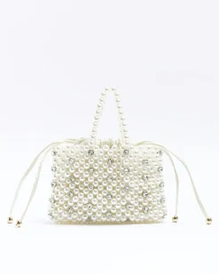 Cream pearl embellished handbag