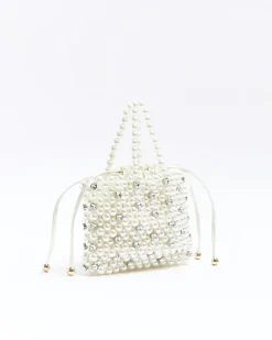 Cream pearl embellished handbag