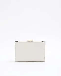 Cream quilted clip top purse