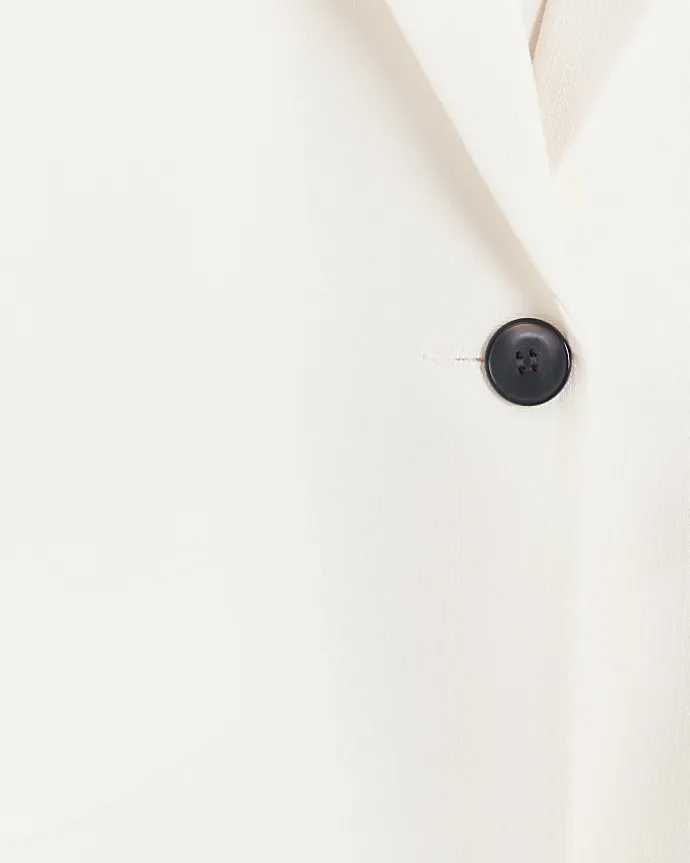 Cream rolled sleeve relaxed blazer