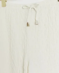 Cream textured wide leg trousers