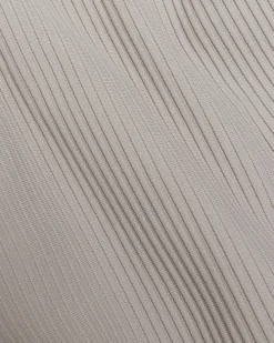 Ecru tapered fit plisse smart trousers