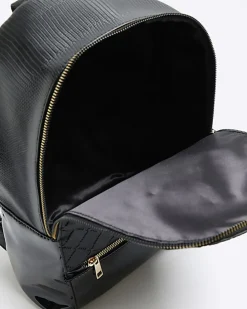 Girls black quilted bow detail backpack