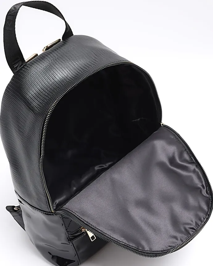 Girls black quilted bow detail backpack
