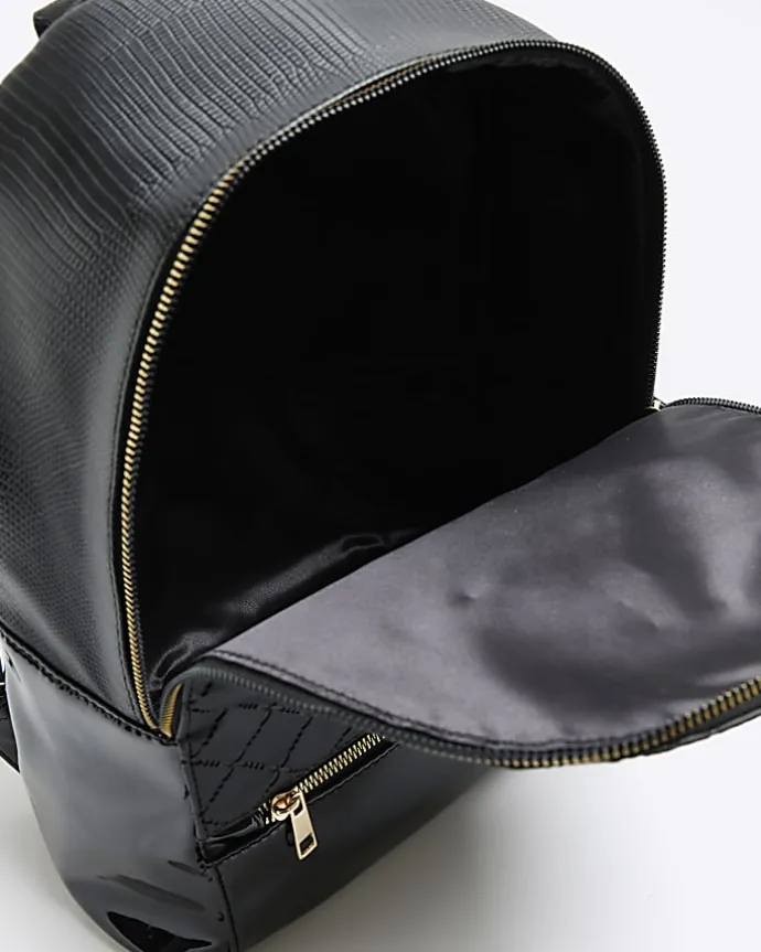 Girls black quilted bow detail backpack